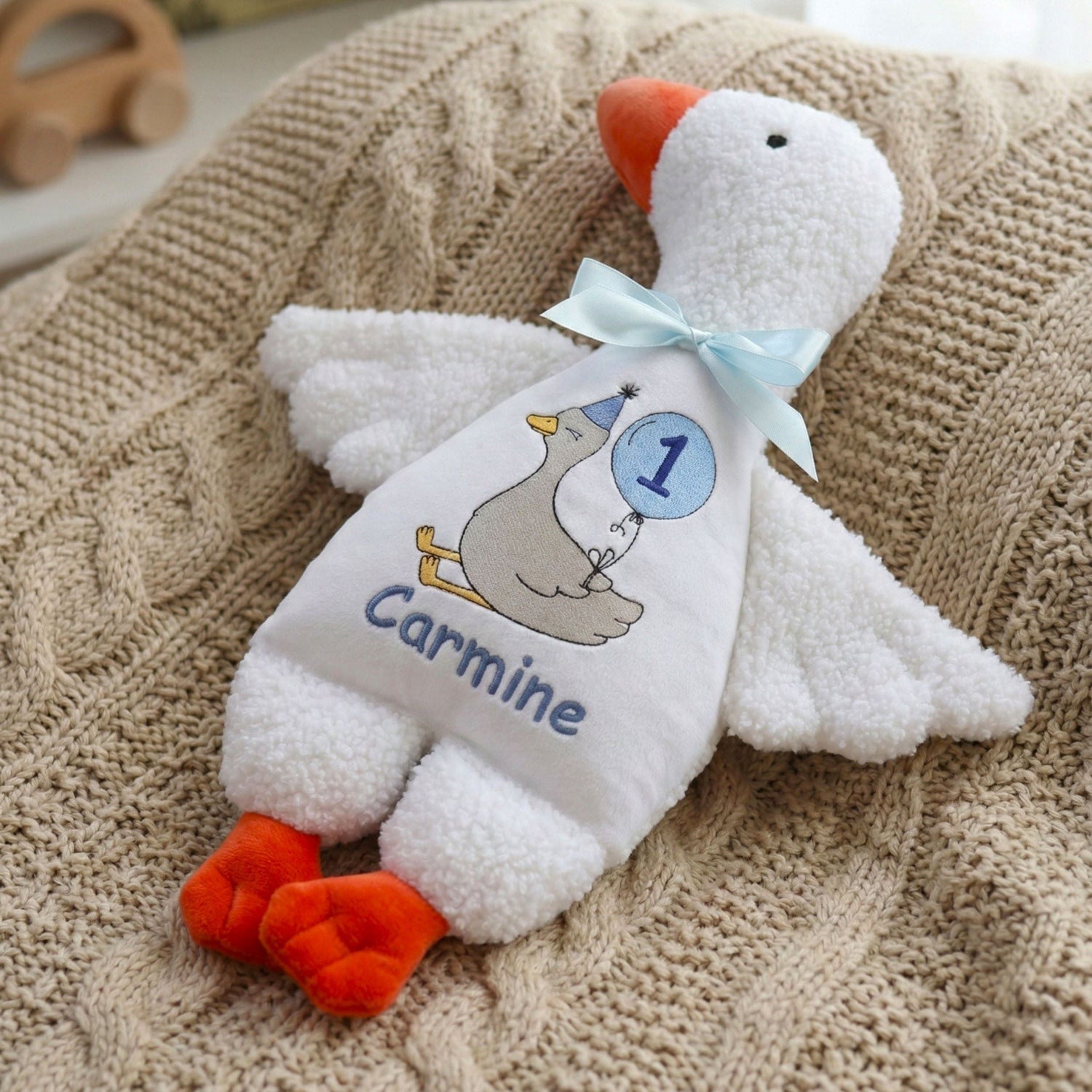 A selection of personalized heirloom baby gifts, including custom embroidered plush toys, name garlands, and keepsakes by My Sunny Bunny Studio.