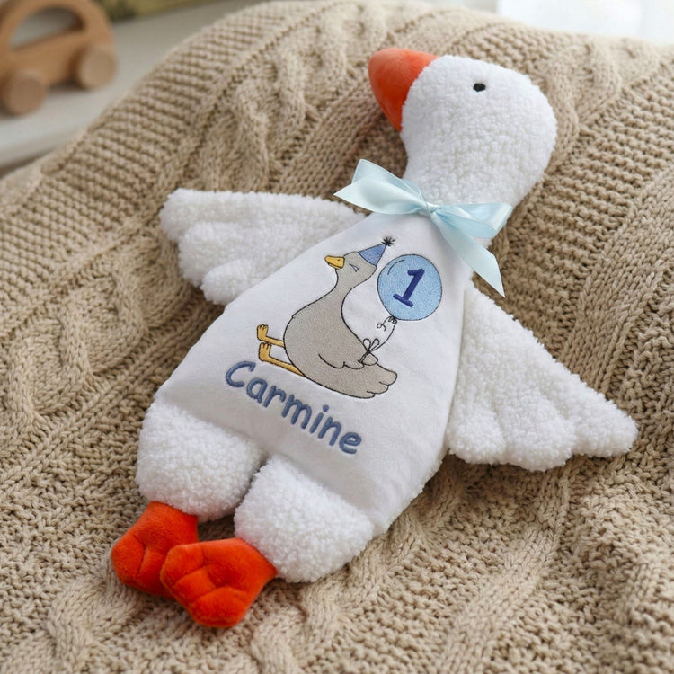 A selection of personalized heirloom baby gifts, including custom embroidered plush toys, name garlands, and keepsakes by My Sunny Bunny Studio.