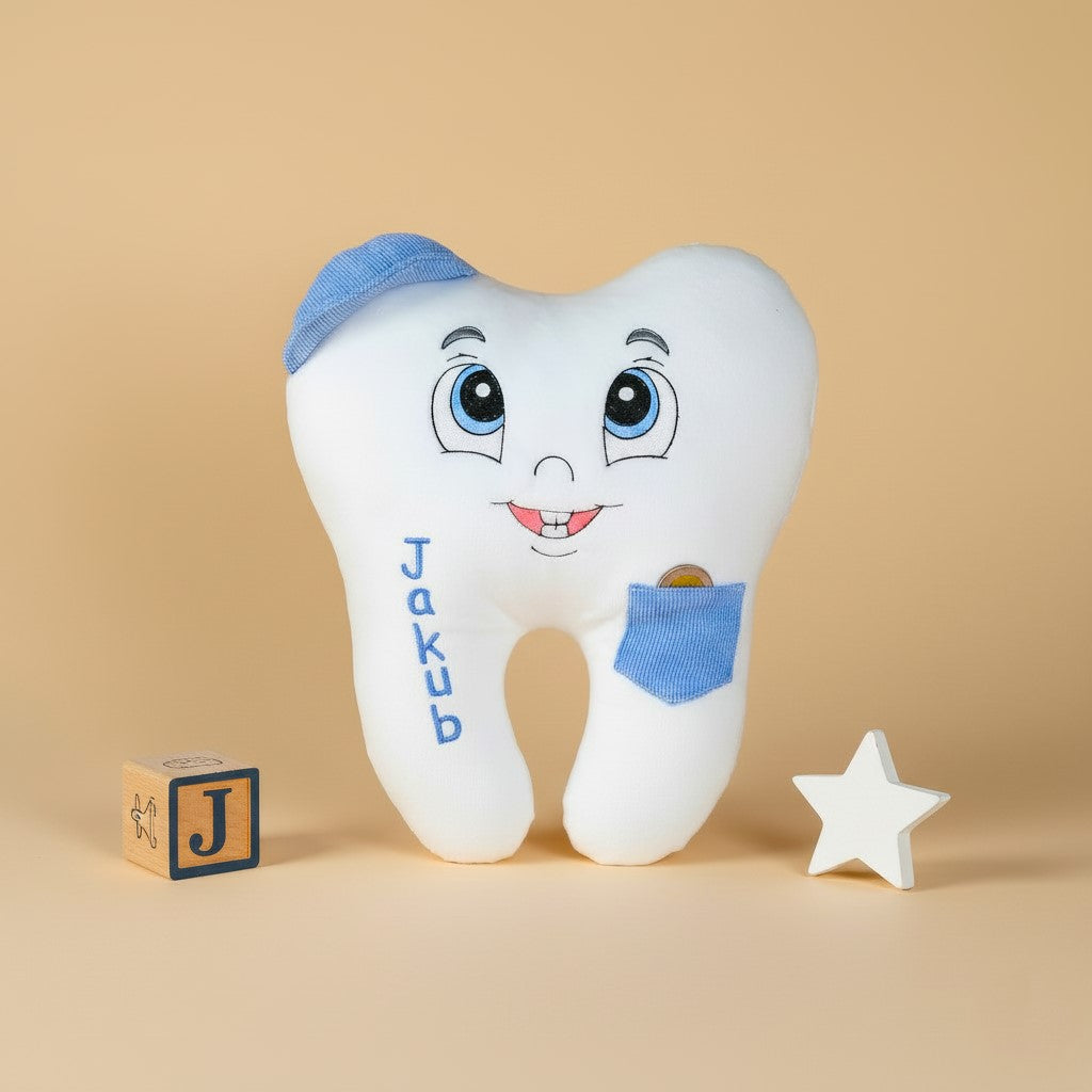 Plush tooth fairy toy with cartoon face and name 'Jakub' on a beige background